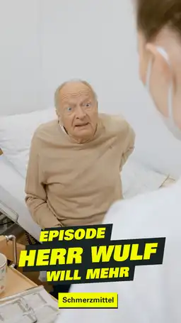 Patient sitzt in einem Bett